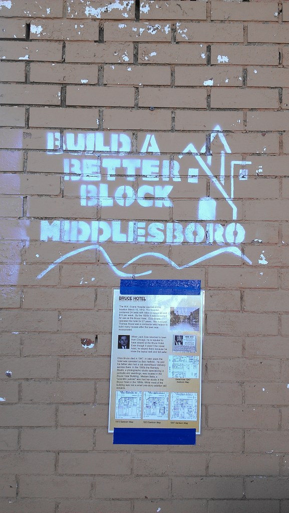 A guerilla historic marker. The laminated page explains the history of the building.